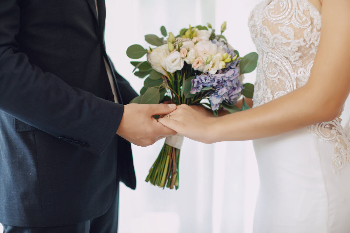 optimize- young-beautiful-bride-is-standing-with-her-husband