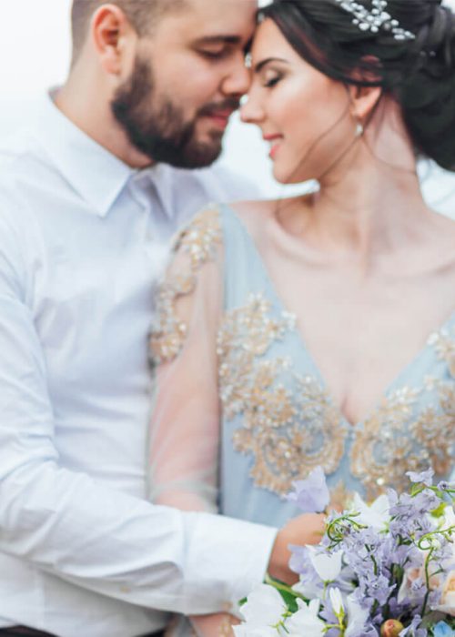 same-couple-with-a-bride-in-a-blue-dress-walk-RBBL2G9.jpg